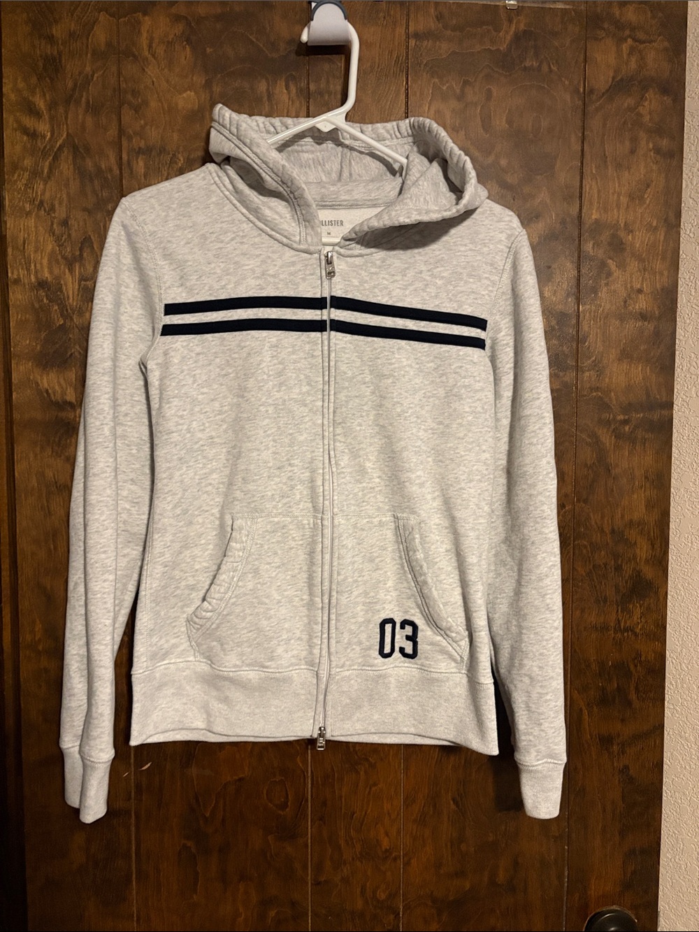 Hollister Men's Light Gray Zip Hoodie with Navy Stripe Detail